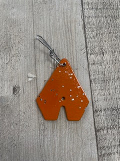 Orange glitter tung tab